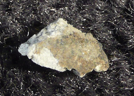 .238 gram crusted fragment
