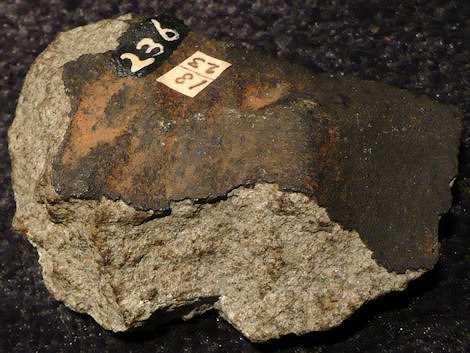 128.51 gram crusted fragment