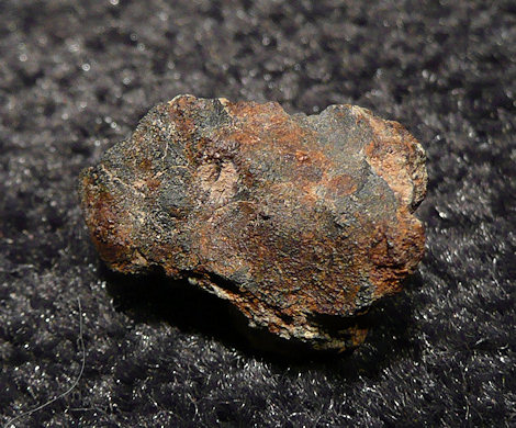 4.04 gram crusted fragment