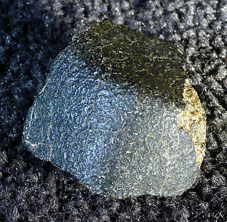 24.844 gram crusted fragment