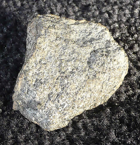24.844 gram crusted fragment (interior)