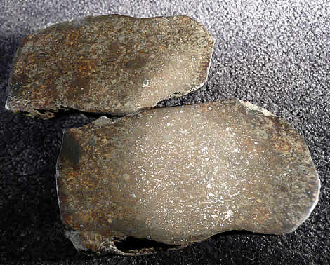 900 gram split individual with armored chondrule at lower-right of top specimen