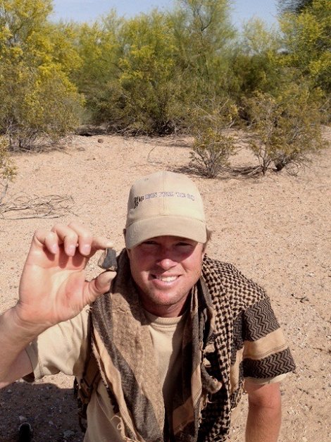 Robert Ward in the Stanfield strewn field with his 28.7 gram find on April 7, 2013