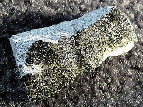11.0 gram crusted fragment