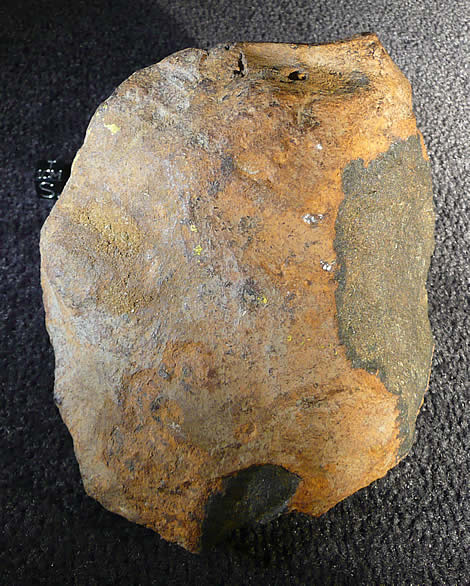 2070 gram main mass (angle featured in May 2004 Meteorite Magazine, including two broken surfaces from Mr. Cannon's initial inspection and from classification material removal)