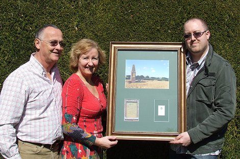 Martin Goff presenting specimen to owners of The Wold Cottage